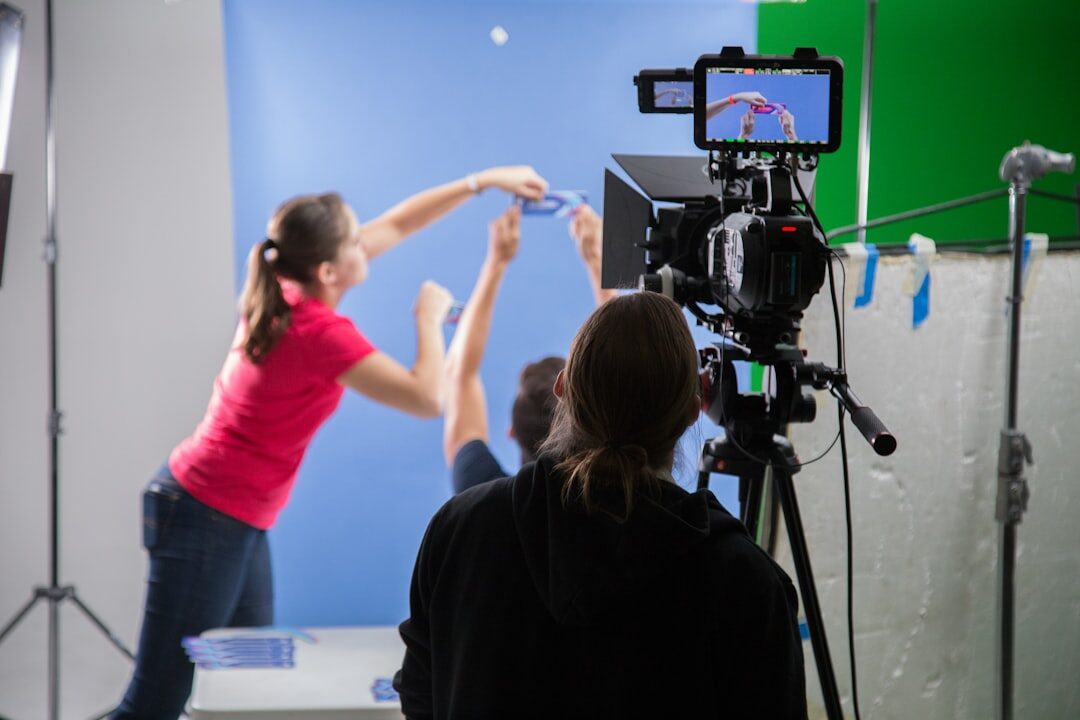 Camera operator planning shots on location