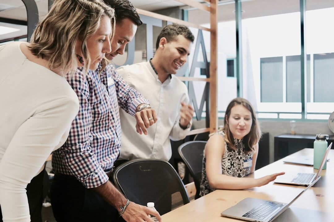 Team of journalists working together in a newsroom